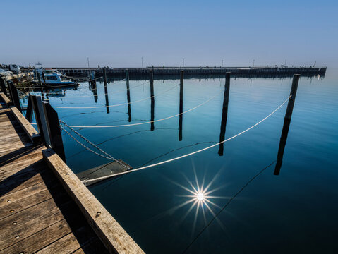 Sunny Day Pier With Pilings