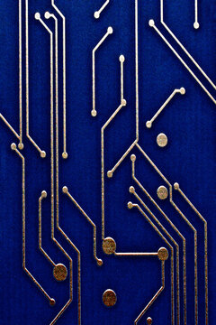 Closeup of purple circuit board with conductor traces