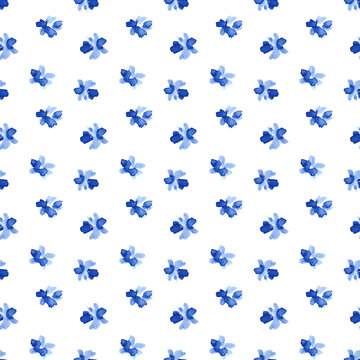 Simple seamless pattern with small cute blue watercolor flowers on a white background. Hand painted floral design for fabric, wallpaper and other surface applications.