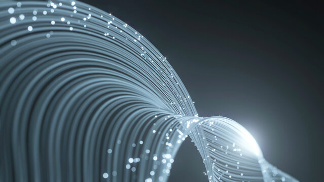 Glowing white fiber optic cables forming elegant abstract waves against dark grey background with sparkles