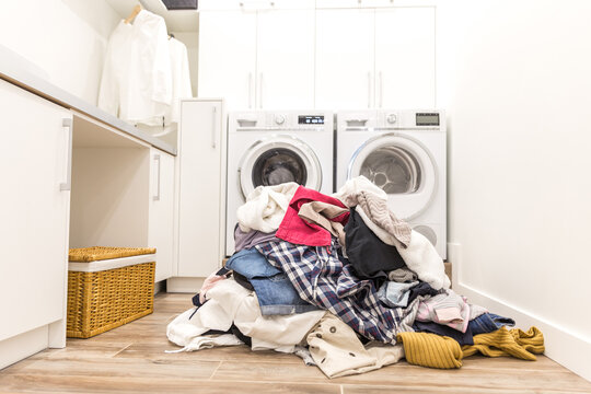 Laudry room with a pile of dirty clothes