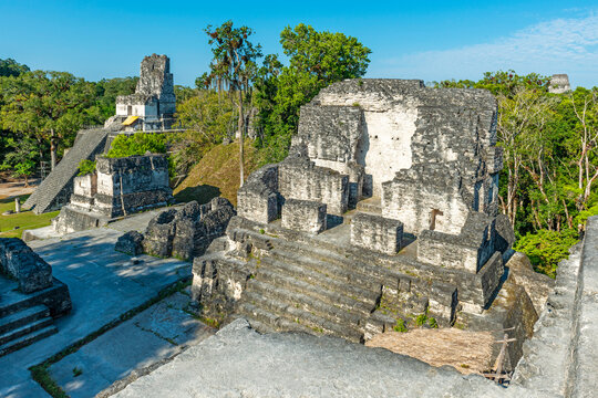 North Acropolis and Temple of the Masks at sunrise, Tikal, Guatemala.