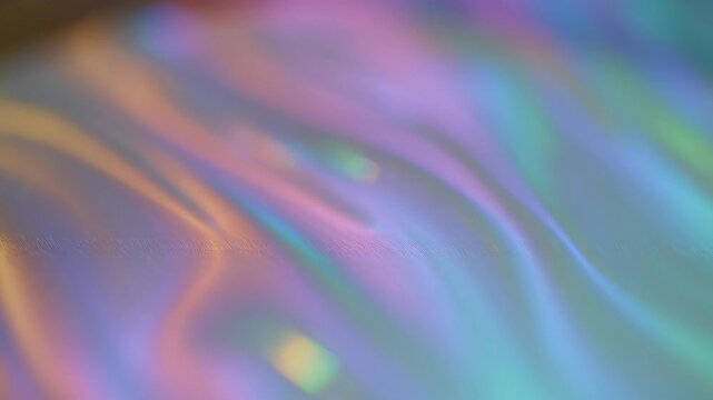Colorful smooth gradient background with soft flowing waves and vibrant pastel hues for digital design