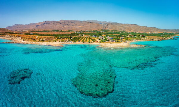 Xerokambos beach and farmland coastline aerial view, Crete, Greece