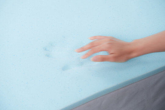 Blue cooling gel memory foam topper sheet isolated on white background, material for mattress and bedding production