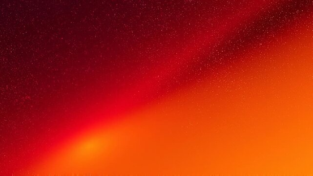 Abstract glowing orange and red cosmic background with bright particles and starry space effect