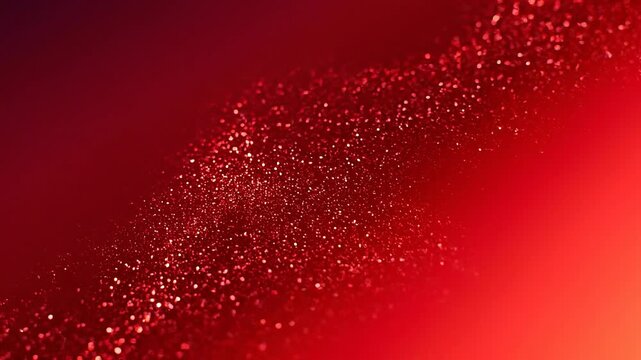 Red glitter sparkling background with bright bokeh and glowing sparkles for festive decoration