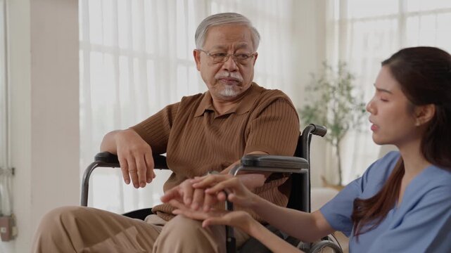 Senior Man Using Walker and Wheelchair With Caregiver Support, Elderly Patient Receiving Mobility Assistance, Rehabilitation and Healthcare at Home With Compassionate Hand Support and Comfort