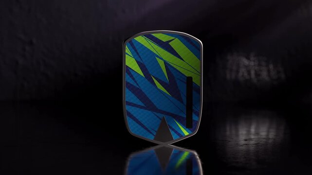 Pickleball paddle featuring vibrant geometric blue and green patterns on dark background