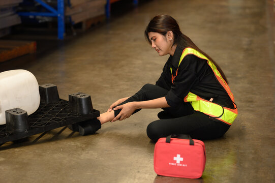 A young woman had an accident while working in a warehouse.