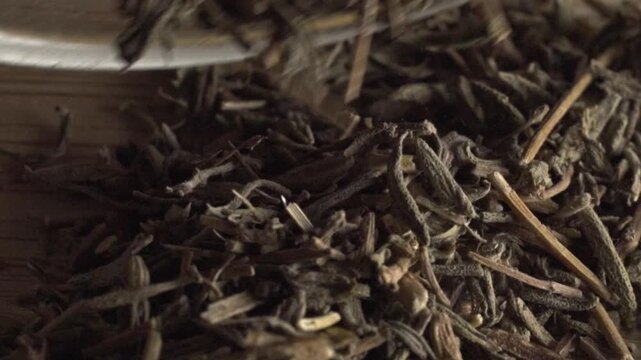 Extreme macro close up of dried culinary herbs highlighting natural texture, earthy color and aromatic ingredients commonly used for cooking, seasoning and food preparation