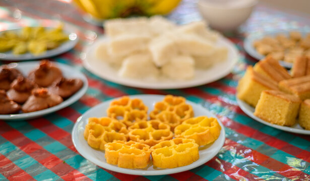 Traditional Sinhala Tamil New Year table with golden kokis and Sri Lankan festive sweets