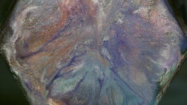 Paint spatter. Color glitter mix. Defocused blue purple bright gem water geometric rhombus spill on abstract acrylic art background.