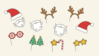 Fototapeta premium Collection of fun Christmas photo booth props including Santa hats, beards, reindeer antlers, and festive glasses.