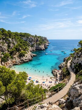 Aerial View of Cala Macarella Beach with Turquoise Water and Wooden Walkway in Menorca, Balearic Islands, Spain