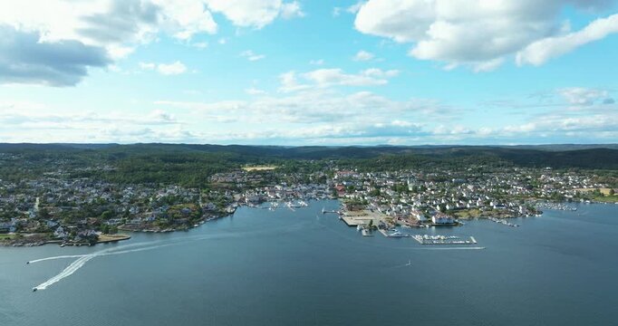Aerial view of Lillesand coastal town Norway showing white clouds