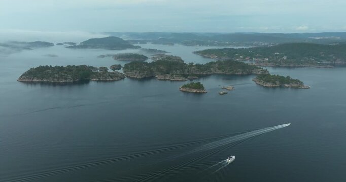 Aerial view of H&oslash;llen Norway coastal archipelago islands showing drone footage