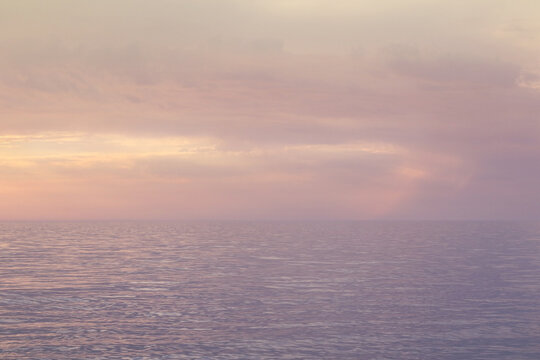 pastel colours calm sunset over the sea 