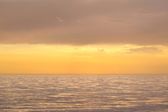 calm golden sunset over the sea