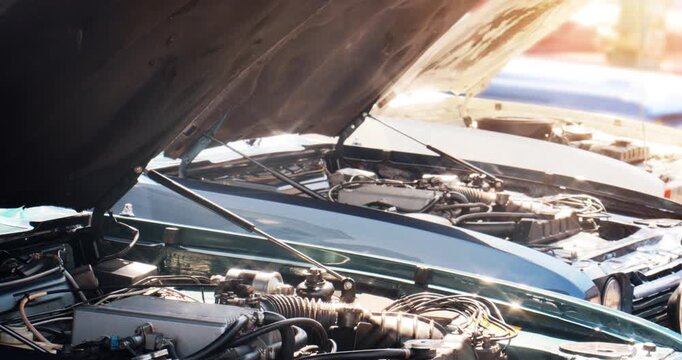 Car collection &ndash; vintage classic luxury automobile motors with raised hoods to show engine.