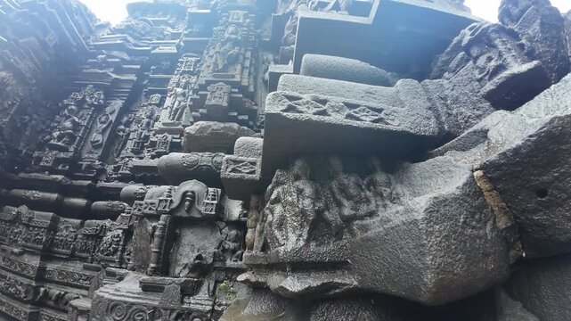 Deeply Carved Wet Stone Bas Relief Figurines at Shri Ambareshwar Shiva Temple, Maharashtra, India 