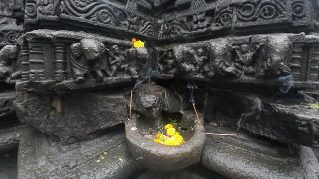 Deeply Carved Wet Stone Bas Relief Figurines at Shri Ambareshwar Shiva Temple, Maharashtra, India 