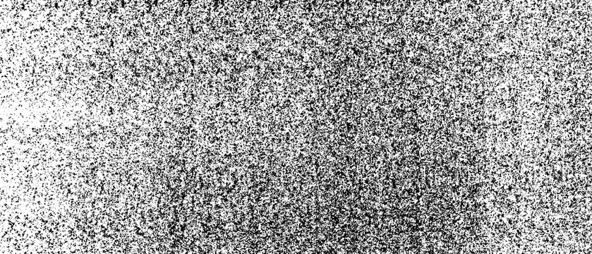Dense black grunge speckle texture on white background with heavy distressed particles and rough ink marks