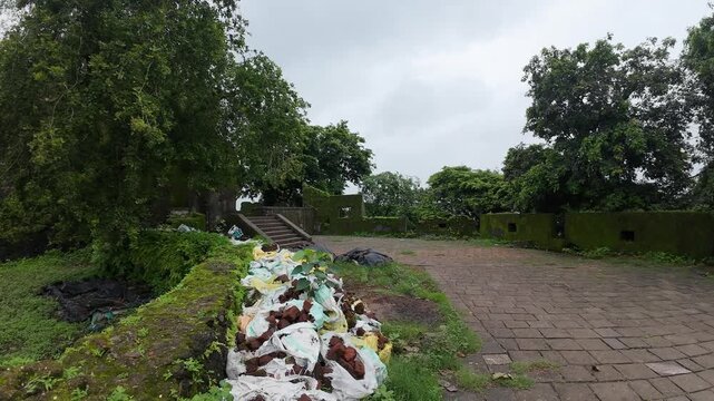 Moss Covered Weathered Stone Walls and Courtyard Ruins of Historic Sion Hillock Fort in Mumbai