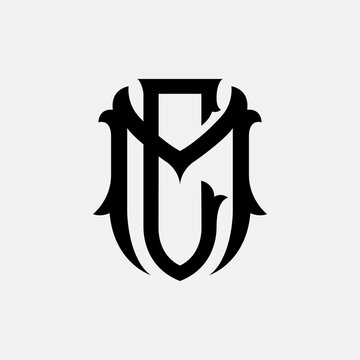 Vintage gothic monogram emblem featuring intertwined letters M and C