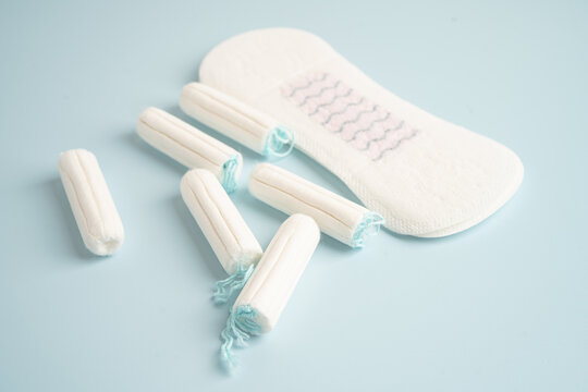 Menstruation cycle with sanitary cotton tampon for woman hygiene and protection.