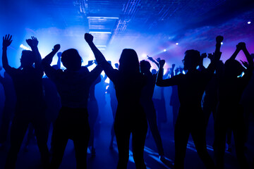 Obraz premium silhouette of disco dancers in night club
