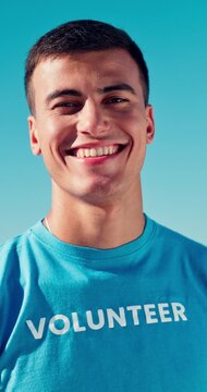 Face, happy man and volunteer outdoor for community service, outreach and social responsibility. Portrait, charity worker and person with smile for humanitarian aid, NGO helper and non profit support
