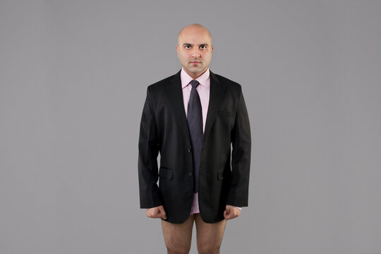 Bald businessman semi naked 