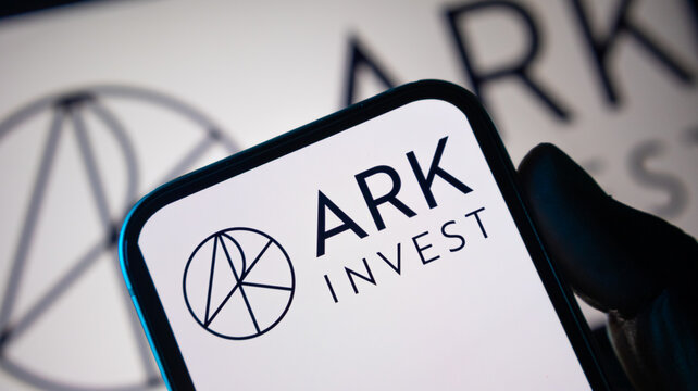 Ark invest corporate logo featured on a smartphone screen for financial news and investment management editorial content.