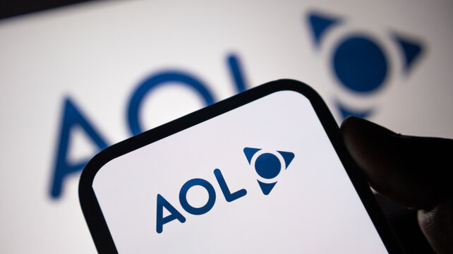 Aol brand logo displayed on smartphone screen with digital blue corporate identity design for media and technology news.