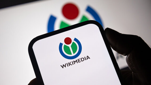 Wikimedia foundation logo displayed on smartphone screen for collaborative knowledge and educational resource.