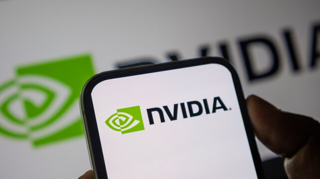 Nvidia logo displayed on smartphone screen with brand name against blurred background for technology news and business reports.