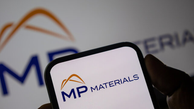 MP Materials logo featured on mobile device screen for rare earth element mining industry update.