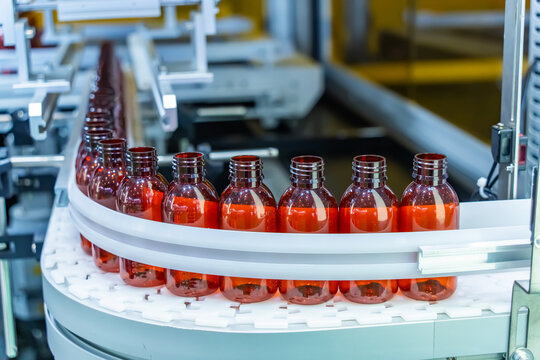 conveyor line for the production of plastic bottles close-up