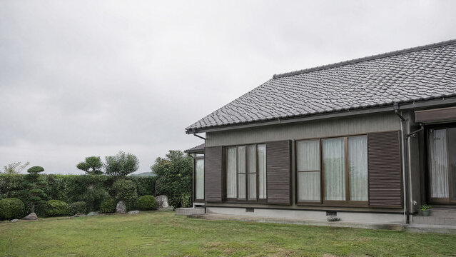 Relaid roof tiles after storm repair in Japan - insurance claim - copy space