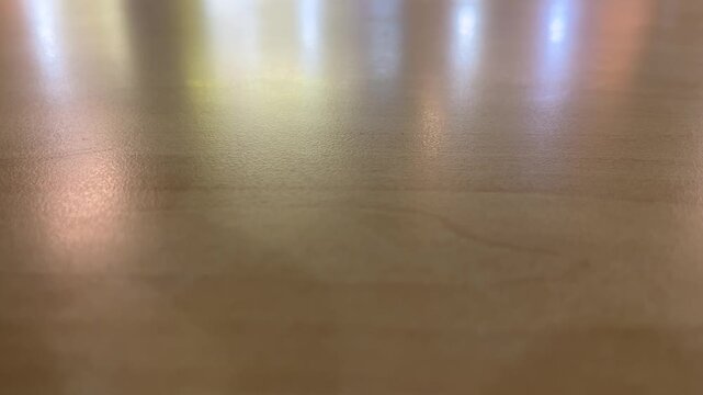 close up view of empty wooden table with shadows. Natural texture in harmonious wood. brown wood plank office table background texture top view. Isolated, copy space, backgrounds. free, negative, text