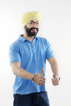 Sikh man giving thumbs-up 