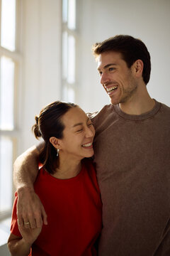 Happy multiracial couple having fun together.