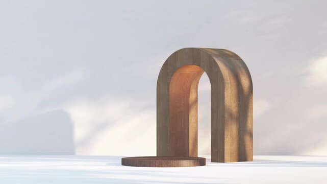 Minimalist wooden arch and round podium on white floor with leaf shadows creating cinematic motion display.