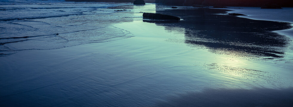 Seascape in the morning. Rocky sea coast at sunrise. Beach Playa de Las Catedrales in Ribadeo, Galicia, Spain, Europe
