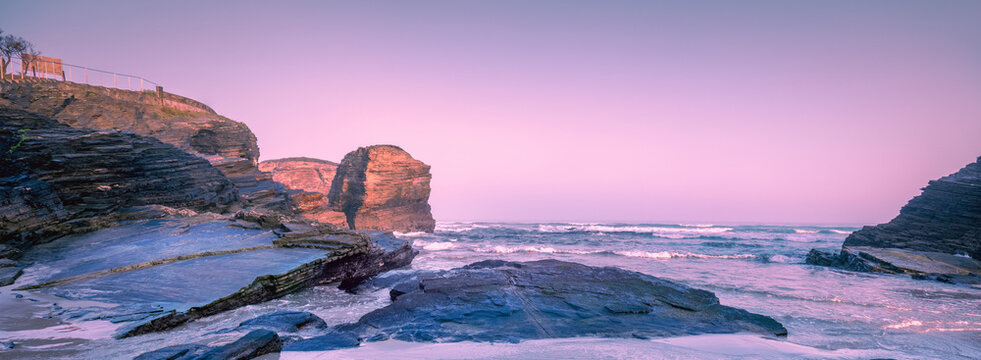 Seascape in the morning. Rocky sea coast at sunrise. Beach Playa de Las Catedrales in Ribadeo, Galicia, Spain, Europe