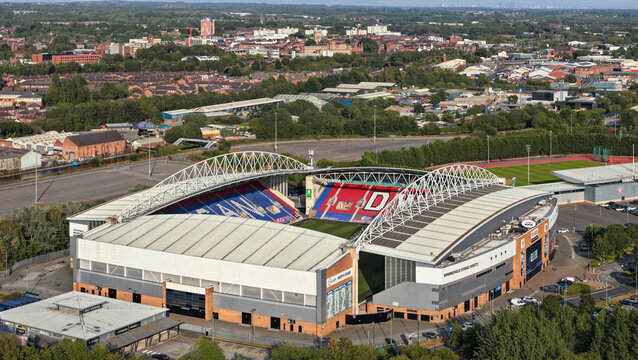 Aerial Image of The Brick Community Stadium and Wigan Townscape