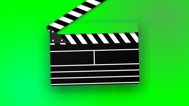 A traditional movie clapperboard rests upon a vibrant chroma key surface to facilitate digital post production editing tasks and visual effects integration for professional film and media