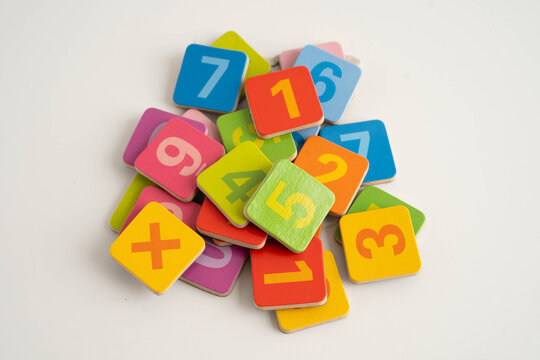 Number wood block cubes for learning Mathematic, education math concept.