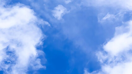 Fototapeta premium blue sky with white clouds and peaceful cloudscape